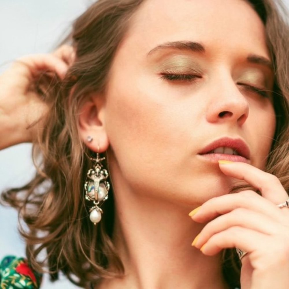 Anthropologie green bug earrings